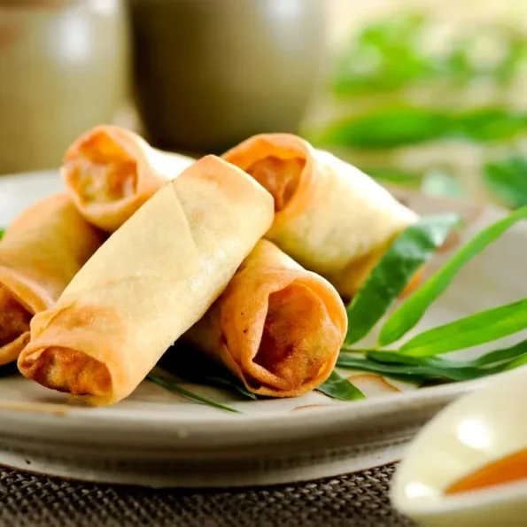 Authentic Recipe Chinese spring rolls Homemade Authentic spring roll recipe Traditional Cuisine Homemade spring rolls Crispy Texture Crispy spring rolls Fresh Vegetables Vegetable spring rolls Easy Preparation Chinese appetizers Flavorful Traditional Chinese cuisine Step-by-Step Guide Easy spring roll recipe Dipping Sauce How to make spring rolls Golden-Brown Asian finger foods Healthy Option Savory spring roll filling Popular Snack Dipping sauce for spring rolls Versatile Dish Golden-brown spring rolls Party Favorite Healthy spring roll options Crave-Worthy Popular Chinese snacks