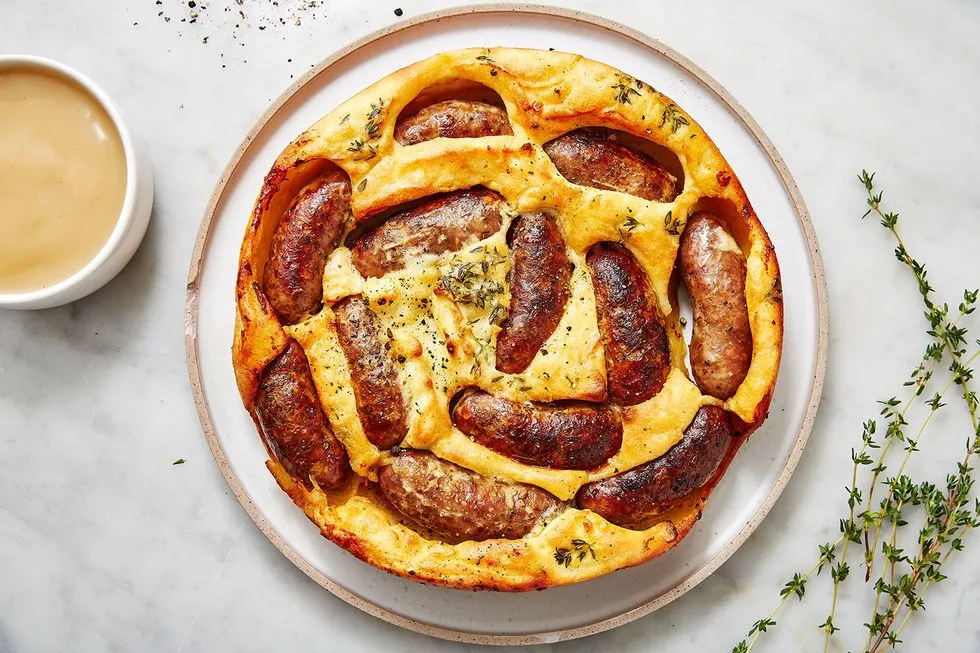 Traditional Toad in the Hole Recipe, Easy Toad in the Hole, British Toad in the Hole, Classic Toad in the Hole Recipe, Best Toad in the Hole, Homemade Toad in the Hole, Toad in the Hole with Onion Gravy, Yorkshire Pudding Toad in the Hole, Authentic Toad in the Hole, How to Make Toad in the Hole, Toad in the Hole Ingredients, Toad in the Hole Cooking Tips, Toad in the Hole for Beginners, Quick Toad in the Hole, Toad in the Hole Variations, Vegetarian Toad in the Hole, Family-friendly Toad in the Hole, Toad in the Hole Meal Ideas, Comfort Food Recipes: Toad in the Hole, Toad in the Hole History and Recipe